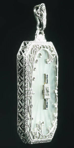 Elegant rock crystal, diamond and sapphire Edwardian filigree white gold pendant